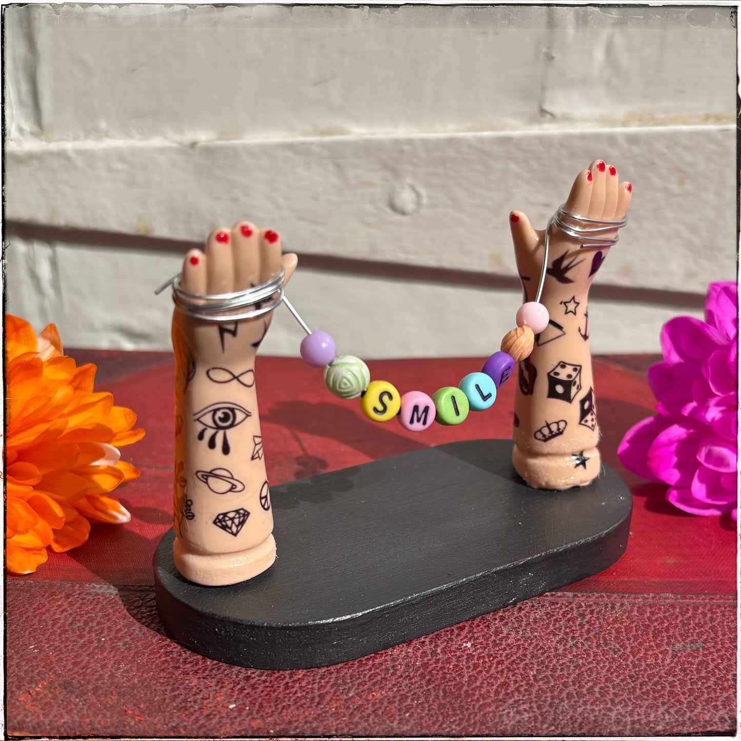 Small Recycled Porcelain Doll Arm Sign Holder - Smile