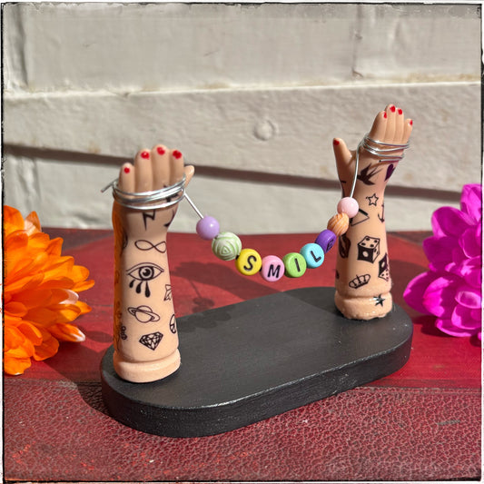 Small Recycled Porcelain Doll Arm Sign Holder - Smile