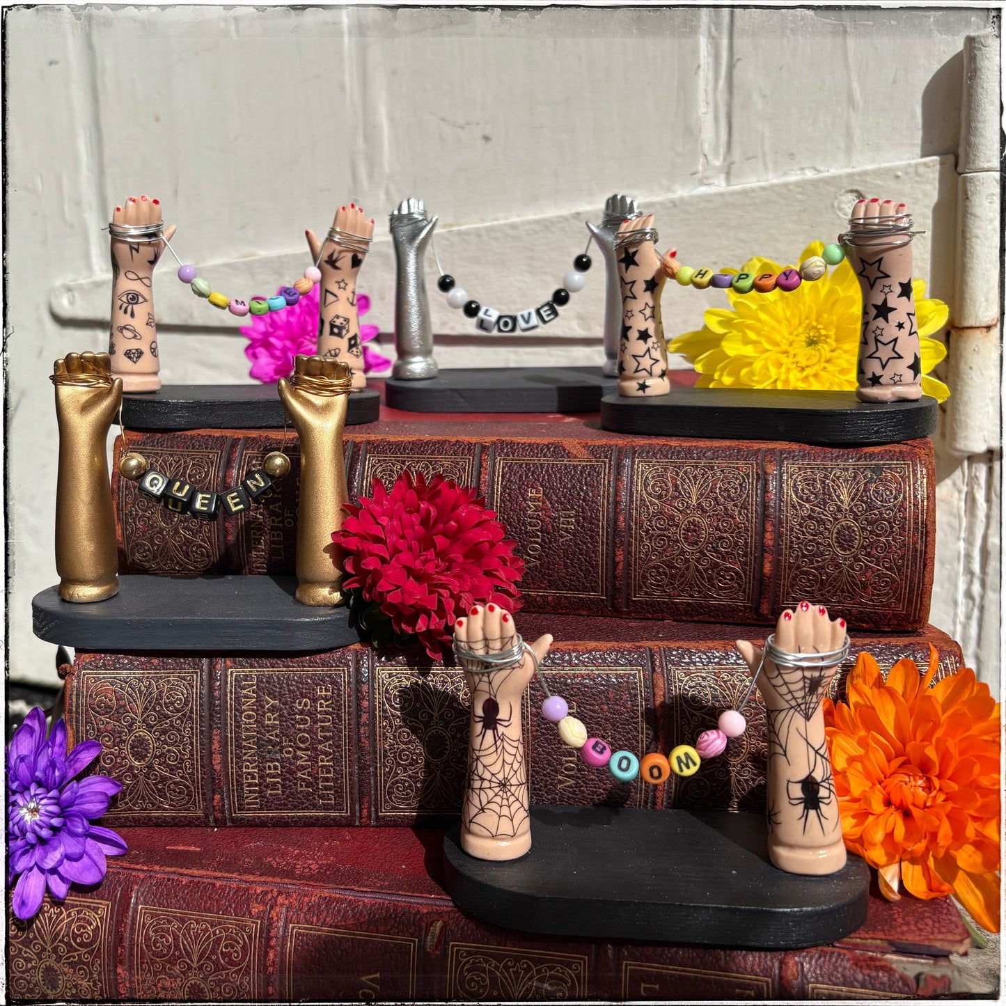 Small Recycled Porcelain Doll Arm Sign Holder - BOOM