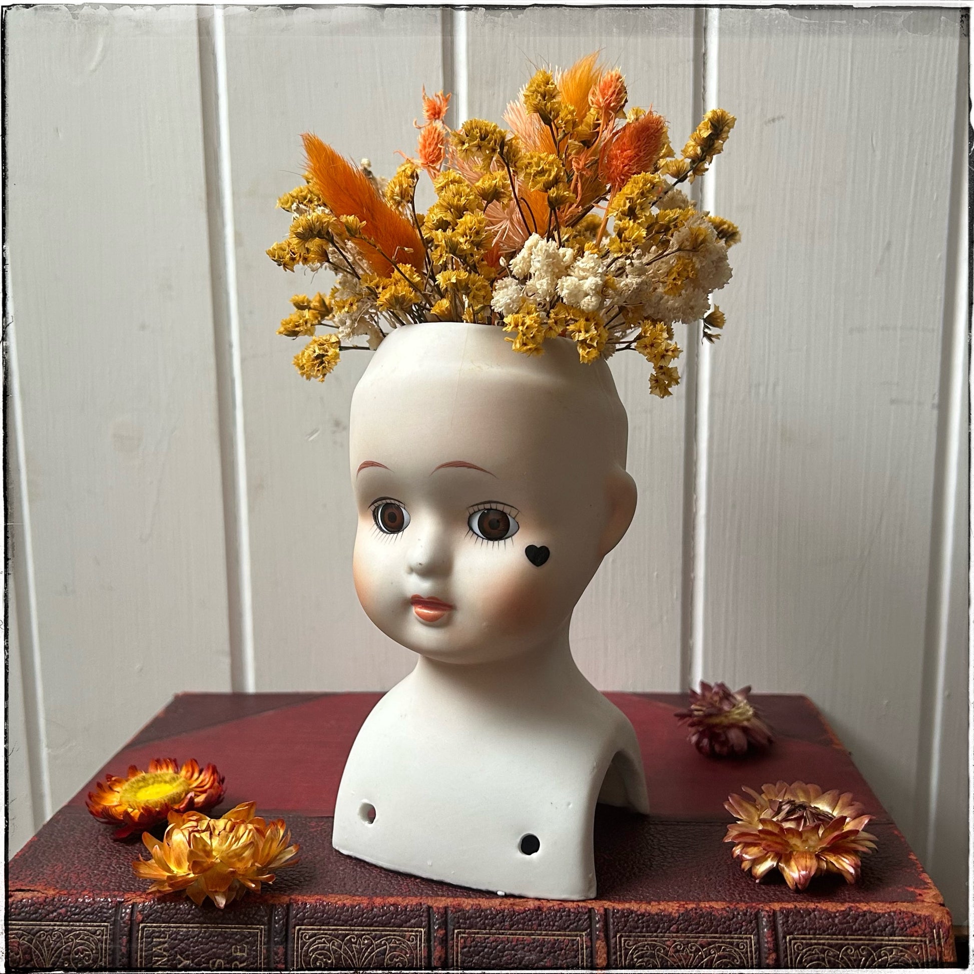 Vintage recycled porcelain doll head - Coral side