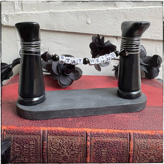 Medium Recycled Porcelain Doll Leg Sign Holder - Stay Weird