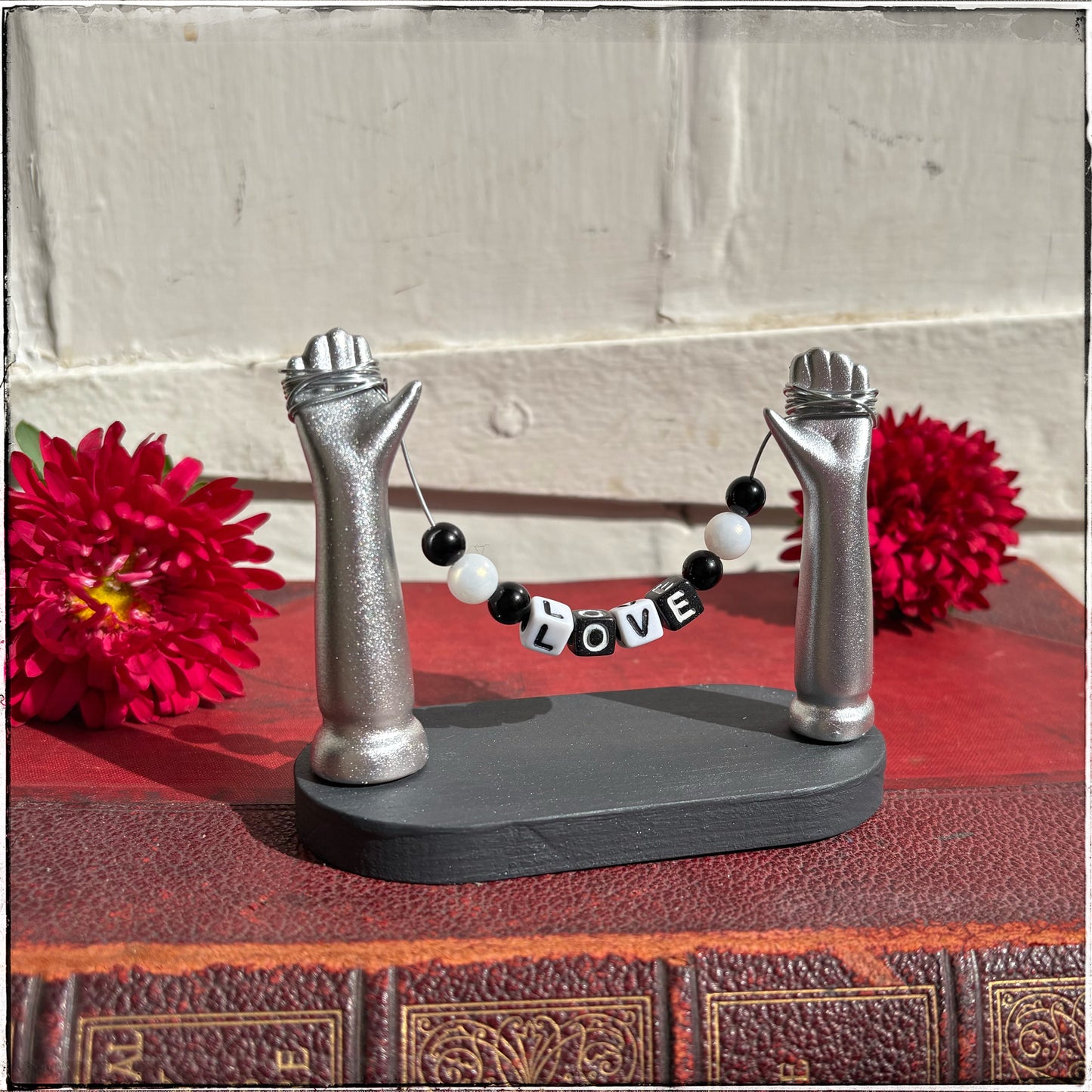 Small Recycled Porcelain Doll Arm Sign Holder - LOVE