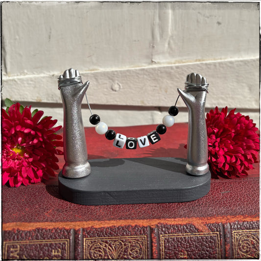 Small Recycled Porcelain Doll Arm Sign Holder - LOVE