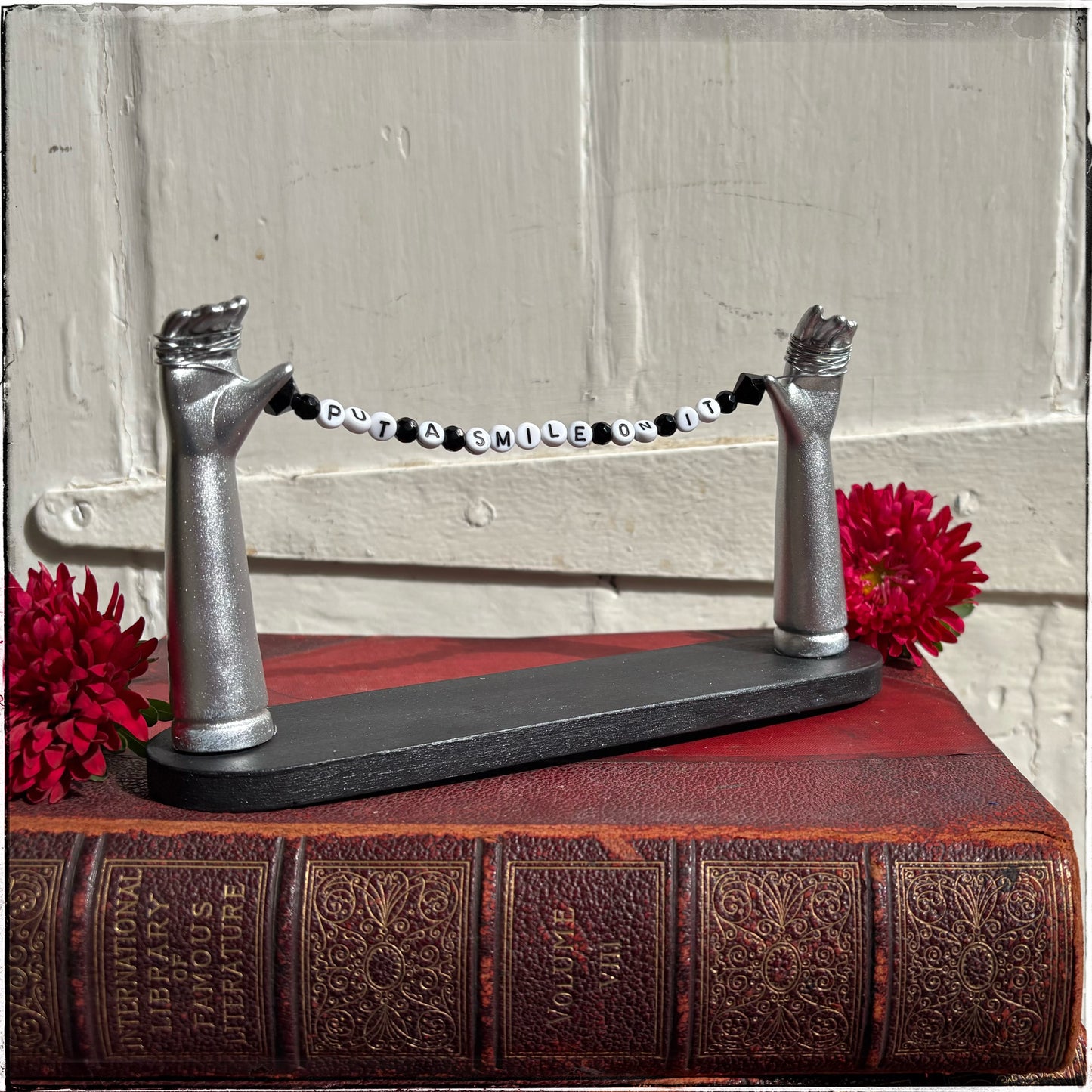 Large Recycled Porcelain Doll Arm Sign Holder - Put A Smile On It