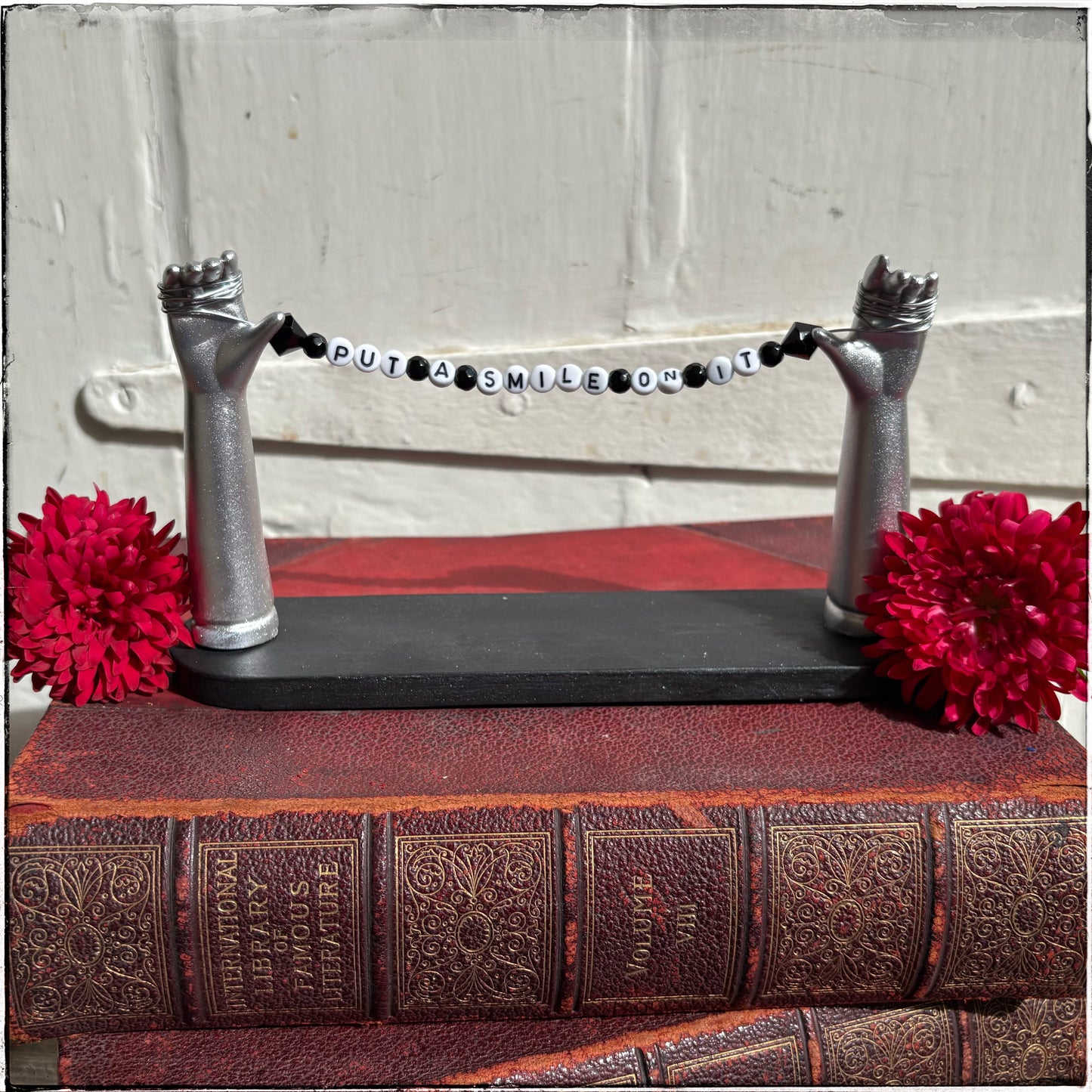 Large Recycled Porcelain Doll Arm Sign Holder - Put A Smile On It