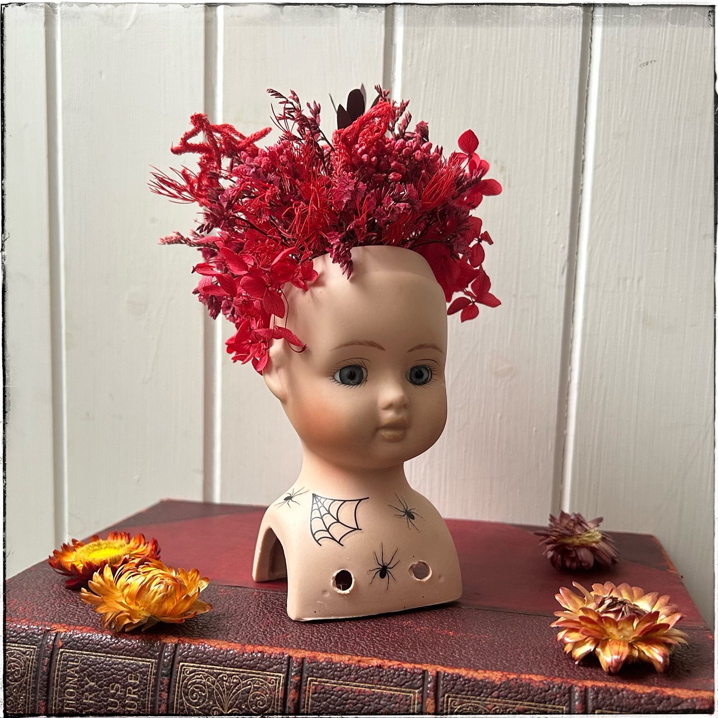 Vintage recycled porcelain doll head -Lottie Side Left